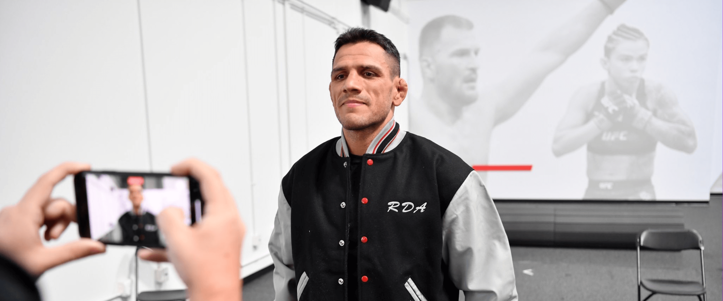 Rafael dos Anjos receiving his jacket for 50 clean tests